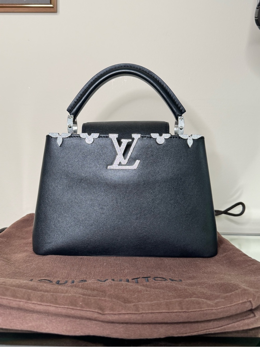 Louis Vuitton Black Top Handle Bag with Crystal LV Accent.